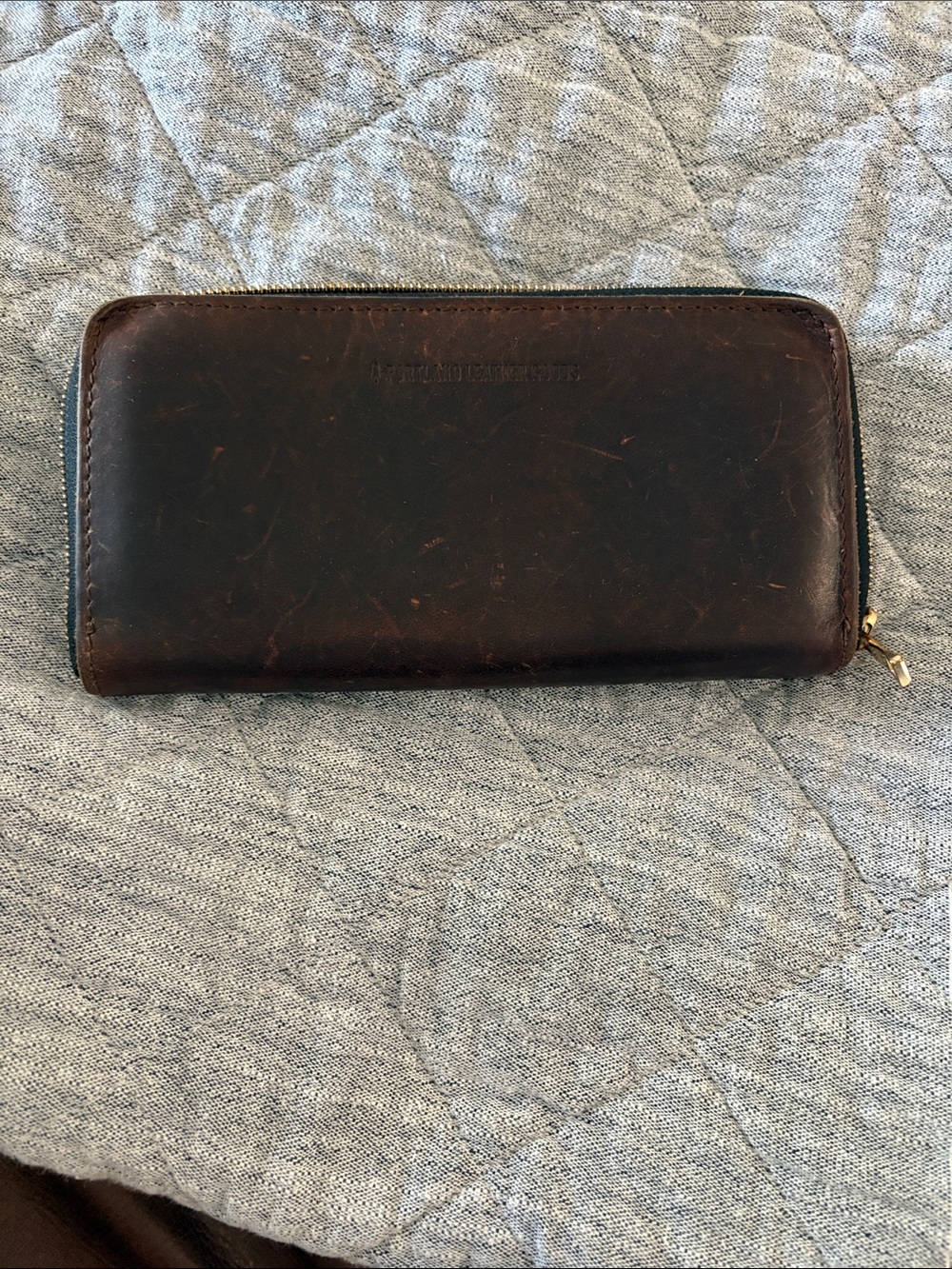 Portland Leather dark brown zip-around leather wallet with gold zipper